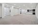 Finished basement with large open space, wet bar, and additional bathroom at 2504 Zenobia St, Denver, CO 80212