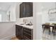 Convenient wet bar with wine cooler and quartz countertop at 2504 Zenobia St, Denver, CO 80212