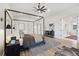 Luxurious primary bedroom with hardwood floors and ensuite bathroom at 2504 Zenobia St, Denver, CO 80212