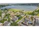 Aerial view of home near lake with green space and city views at 2504 Zenobia St, Denver, CO 80212