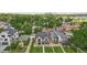 Aerial view of three modern homes with city skyline in background at 2504 Zenobia St, Denver, CO 80212
