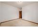 Simple bedroom with carpet and a door at 221 Common Dr, Berthoud, CO 80513