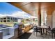 Outdoor grilling station with seating area for residents at 4200 W 17Th Ave # 618, Denver, CO 80204