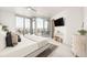 Bright bedroom with city views, featuring a comfortable bed and ample natural light at 4200 W 17Th Ave # 618, Denver, CO 80204