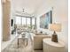 Modern living room with large windows and mountain views at 4200 W 17Th Ave # 618, Denver, CO 80204