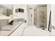 Contemporary bathroom with a walk-in shower and double sinks at 4200 W 17Th Ave # 618, Denver, CO 80204