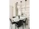 Modern kitchen with white cabinets and a large island at 4200 W 17Th Ave # 618, Denver, CO 80204