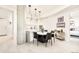 Modern dining area with a large island and concrete pillar at 4200 W 17Th Ave # 618, Denver, CO 80204