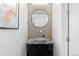 Modern powder room with floating sink and granite countertop at 4200 W 17Th Ave # 618, Denver, CO 80204