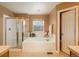 Bathroom with a soaking tub and separate shower at 4961 Aspen Creek Dr, Broomfield, CO 80023