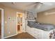 Charming bedroom with built-in shelves and an ensuite bathroom at 4961 Aspen Creek Dr, Broomfield, CO 80023