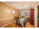 Bright dining room with a table for four and natural light at 4961 Aspen Creek Dr, Broomfield, CO 80023