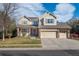 Lovely two-story home with a three-car garage and well-maintained landscaping at 4961 Aspen Creek Dr, Broomfield, CO 80023