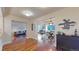 Elegant entryway with hardwood floors, offering views of living and dining areas at 1891 Curtis St # 1613, Denver, CO 80202