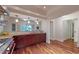 Updated kitchen with hardwood floors, granite counters, and stainless steel appliances at 1891 Curtis St # 1613, Denver, CO 80202