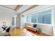 Sunlit sitting area with hardwood floors and city views at 1891 Curtis St # 1613, Denver, CO 80202