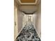 Elegant hallway with patterned carpeting and neutral wall tones at 1891 Curtis St # 1613, Denver, CO 80202