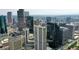 Drone shot of the building and the Denver skyline at 1891 Curtis St # 1613, Denver, CO 80202
