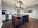 Modern kitchen in the common area, featuring sleek appliances and a wood countertop at 1891 Curtis St # 1613, Denver, CO 80202