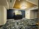 Upscale hallway featuring dark-blue walls, decorative carpeting, and modern lighting at 1891 Curtis St # 1613, Denver, CO 80202