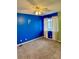 Spacious bedroom with blue walls and neutral carpeting at 1920 S Oswego Way, Aurora, CO 80014