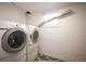 Basement laundry area with washer and dryer at 1553 Osceola St, Denver, CO 80204