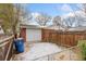 Backyard with detached garage and basketball hoop at 4660 S Pennsylvania St, Englewood, CO 80113