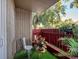 Private patio with artificial turf and seating area at 2281 S Vaughn Way # 111A, Aurora, CO 80014