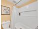 Updated bathroom with a tub/shower, a new vanity, and stylish decor at 2281 S Vaughn Way # 111A, Aurora, CO 80014