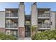 Exterior view of a two-story building with balconies at 519 Wright St # 304, Lakewood, CO 80228