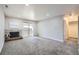 Spacious living room with fireplace and access to a balcony at 519 Wright St # 304, Lakewood, CO 80228