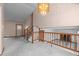 Upper-level view of living room and staircase at 19867 E Brown Pl, Aurora, CO 80013