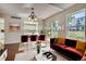 Spacious living room features a large window and plenty of natural light at 2466 S Vaughn Way # B, Aurora, CO 80014