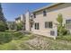 Backyard view of the house with a patio at 2466 S Vaughn Way # B, Aurora, CO 80014