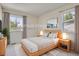 Bright bedroom with light wood furniture and neutral decor at 2466 S Vaughn Way # B, Aurora, CO 80014