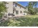 Home features a backyard with a patio and grill at 2466 S Vaughn Way # B, Aurora, CO 80014
