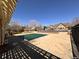 Community pool with a cover and nearby clubhouse at 13900 Lake Song Ln # B1, Broomfield, CO 80023