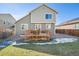 House exterior with deck and fenced backyard at 3174 S Kirk Way, Aurora, CO 80013