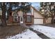 Attractive brick home with a two-car garage and landscaping at 4638 S Mobile Way, Aurora, CO 80015