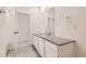 Clean bathroom with single vanity and shower/tub combo at 14554 W 91St Dr # A, Arvada, CO 80005