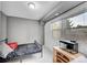 Bedroom with a bed, fish tank, and window at 1550 S Telluride St, Aurora, CO 80017