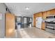 Kitchen with an open concept layout, connecting to the living room at 1550 S Telluride St, Aurora, CO 80017