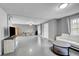 Open living area featuring a white couch and coffee table at 1550 S Telluride St, Aurora, CO 80017