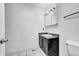 Simple bathroom with vanity, toilet, and medicine cabinet at 1550 S Telluride St, Aurora, CO 80017