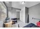 Bedroom with a bed, storage, and a door to another room at 1550 S Telluride St, Aurora, CO 80017