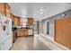 Bright kitchen offering ample cabinet space and a view to the backyard at 1550 S Telluride St, Aurora, CO 80017