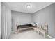 Small bedroom with a hospital bed and two chairs at 1550 S Telluride St, Aurora, CO 80017