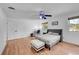 Primary bedroom with a bed, ottoman, and ceiling fan at 1550 S Telluride St, Aurora, CO 80017