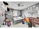 bedroom with a bed, dresser, and wall decorations at 1550 S Telluride St, Aurora, CO 80017
