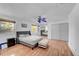 Primary bedroom with a bed, ottoman, and ceiling fan at 1550 S Telluride St, Aurora, CO 80017